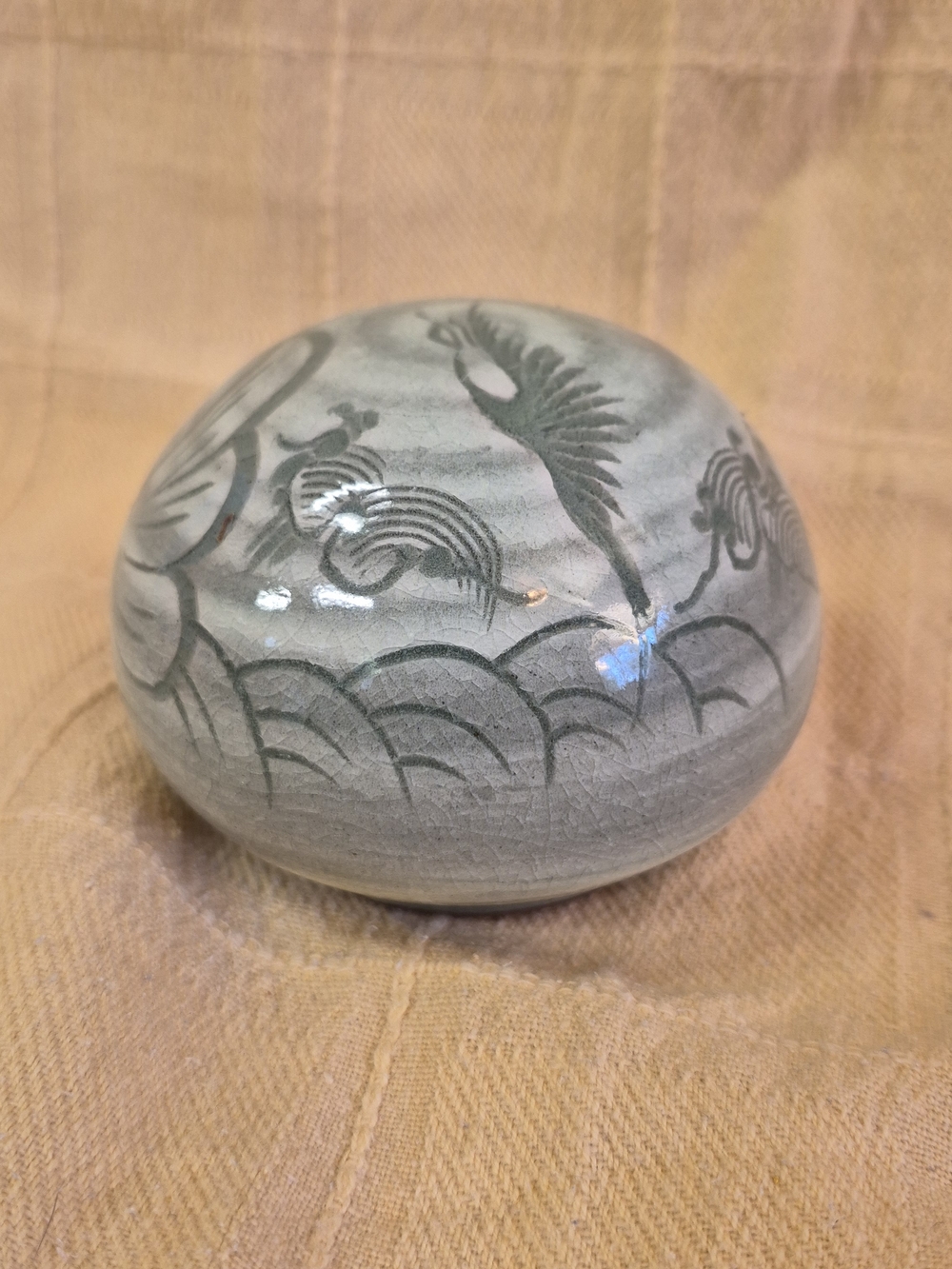 Hand-Painted Gray Ceramic Paperweight with Crane Motif